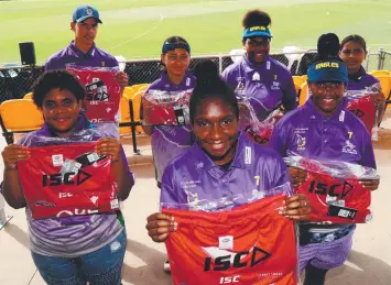  ?? Picture: STEWART McLEAN ?? Cape York Eagles players Ci'ele DAvid, 13, Steven Gilbert, 14, Chenayda Bowie, 12, Lency Asse, 15, Elise Baira, 15, Shakimah Baira, 13, and Esther Bowie, 13, with their training shirts donated by Sydney Swans.