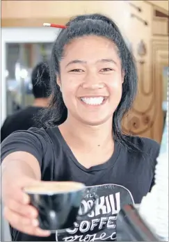  ??  ?? Last call: Roskill Coffee Project employee Kesaia Sisi, 20, is serving up some of her last brews at the cafe.