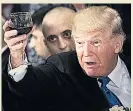  ??  ?? CHEERS Trump raises a glass at UN