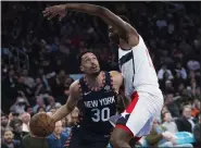  ?? ASSOCIATED PRESS FILE PHOTO ?? Washington Wizards center Thomas Bryant guards New York Knicks guard John Jenkins (30) during the second half of a 2019 game at Madison Square Garden in New York.