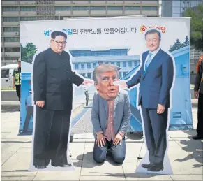  ?? [ Reuters ] ?? Protest gegen Donald Trumps Zick-Zack-Nordkorea-Kurs in Seoul.