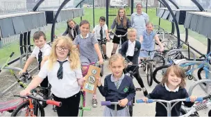  ??  ?? Pupils from Porthcawl Primary School with their Big Pedal award