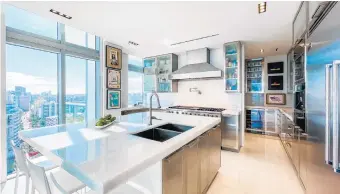  ?? BRIGHT LIFESTYLE FOR ONE SOTHEBY’S INTERNATIO­NAL REALTY ?? This Miami Beach penthouse has four bedrooms, five baths, a private elevator, a state-of-the-art kitchen and a rooftop terrace complete with an outdoor kitchen, grill and pool.