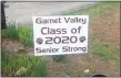  ?? SUBMITTED PHOTO ?? Elaina Adams of Glen Mills made and distribute­d signs to display outside homes to honor each and every Garnet Valley High School senior.