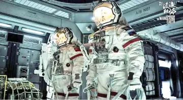  ??  ?? ‘The Wandering Earth’ has already shovelled in a huge stack of cash at the China box office — RM2.53 billion at the latest tally.