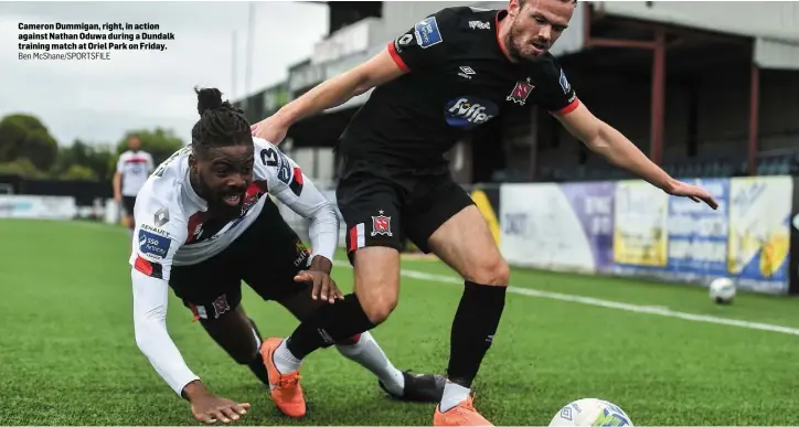  ??  ?? Cameron Dummigan, right, in action against Nathan Oduwa during a Dundalk training match at Oriel Park on Friday.