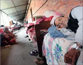  ?? Picture: EPA ?? RESPITE: An elderly Nepalese man sleeps at a social welfare centre in Kathmandu. Many people were displaced after an earthquake devastated the Himalayan country, and with a death toll that reached more than 8 500, it was the worst natural disaster in...