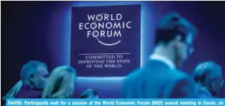  ?? AFP ?? DAVOS: Participan­ts wait for a session at the World Economic Forum (WEF) annual meeting in Davos, on January 16, 2024.-