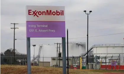  ?? Photograph: LM Otero/AP ?? Exxon has stopped short of setting reduction targets for the emissions created by burning its oil and gas, known as scope 3 emissions.