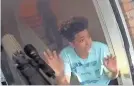  ?? LMPD BODY CAM VIDEO ?? SWAT officers arrived at the door of a Louisville, Ky., family’s home on the morning of Oct. 26, 2018, breaking the door down.