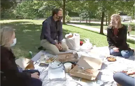  ?? ABC7 ?? Sun- Times reporter Stephanie Zimmermann ( from left), ABC7 reporter Jason Knowles and Jennifer Dunn of the Northweste­rn- Argonne Institute of Science and Engineerin­g have a picnic to look at the amount of plastic waste even one takeout or delivery meal creates.