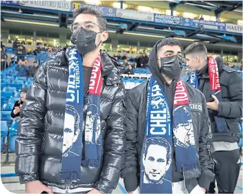  ??  ?? These Chelsea fans were taking no chances during the FA Cup tie with Liverpool