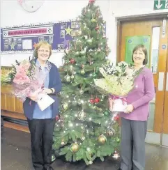  ??  ?? Popular Elizabeth McLean (left) and Janice Mason of Burnside Primary School