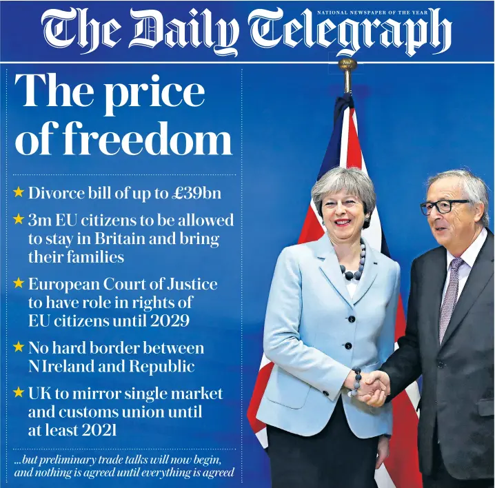  ??  ?? Theresa May and Jean-claude Juncker shake hands after finalising the Brexit agreement in Brussels yesterday