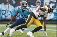  ?? (AP/Wade Payne) ?? Pittsburgh Steelers wide receiver Diontae Johnson (right) gets past Tennessee Titans cornerback Johnathan Joseph en route to a touchdown in the first half Sunday in Nashville, Tenn. Johnson had two touchdowns to help the Steelers win 27-24 and improve to 6-0 for the first time since 1978.