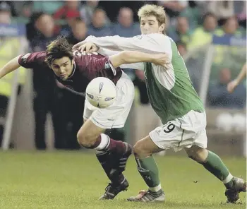  ??  ?? Kevin Thomson celebrates after scoring for Rangers against Celtic at Ibrox in March 2008. Above, Thomson on Edinburgh derby duty as he tussles with Hearts midfielder Paul Hartley during his first spell at Hibs, and, right, coaching youngsters at his football academy.