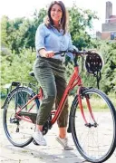 ??  ?? Novice: Susanna on her bike