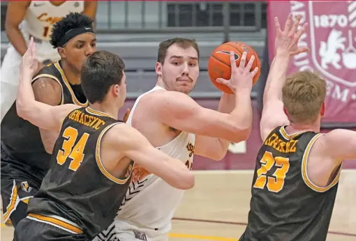  ?? CHARLES REX ARBOGAST/AP ?? Cameron Krutwig has followed in the footsteps of Clayton Custer and Marques Townes in winning MVC player of the year honors.