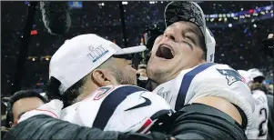  ?? — AP ?? Patriots’ Kyle Van Noy (left) and Rob Gronkowski celebrate after the Super Bowl on Sunday. Gronkowski says he will decide his future in the next few days.