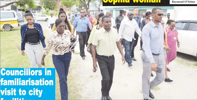  ??  ?? The City Council members at the South Road Day Care Centre yesterday. (Department of Public Informatio­n photo)