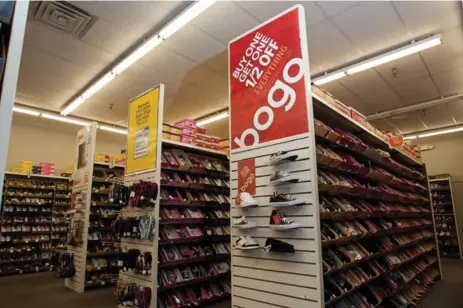  ?? JOEY FOLEY/GETTY IMAGES FILE PHOTO ?? Payless, which was founded in Kansas in 1956, is reportedly struggling as mall traffic declines and consumers shift to online retailers such as Amazon.