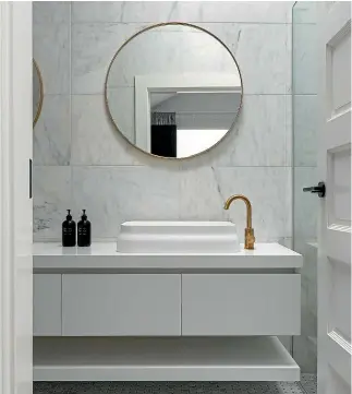  ??  ?? A soft-toned Auckland bathroom by designers Kristen Basra and Emma Kate Bamford.