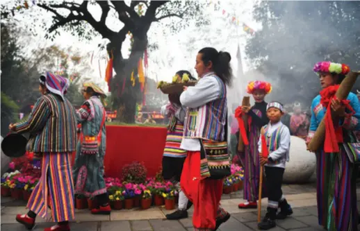  ??  ?? Derung people celebrate the Kaquewa Festival, the most important festival for the Derung ethnic group, in Yunnan Nationalit­ies Village in Kunming, capital city of Yunnan Province, on January 1