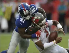  ?? PHOTO/JASON BEHNKEN ?? New York Giants cornerback Dominique Rodgers-Cromartie sacks Tampa Bay Buccaneers quarterbac­k Jameis Winston during the second half of an NFL football game Sunday in Tampa, Fla. AP