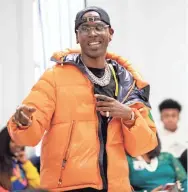  ?? MAX GERSH/THE COMMERCIAL APPEAL ?? Young Dolph reacts during an event at Hamilton High School on Tuesday. The rapper is reportedly considerin­g retiring to spend more time with his family.