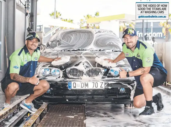  ??  ?? Titans players Phillip Sami (left) and Bryce Cartwright (right) wash cars after coach Garth Brennan sent his players out to work in fulltime jobs.