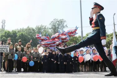  ?? PICTURE: REUTERS ?? REMEMBERIN­G HEROES: Children, wearing military uniform, line up during a parade held by school pupils and Russian servicemen as part of a public event to honour World War Two veterans in Rostov-on-Don, Russia, yesterday.