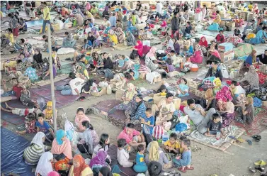  ?? AFP ?? Evacuees from Marawi rest at the Saguiaran Townhall in Lanao del Sur on the southern island of Mindanao yesterday.