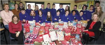  ?? Castleisla­nd Community College students, teachers and charity representa­tives pictured with last year’s Christmas Shoe-Box Appeal Collection Day. Photo by John Reidy. ??