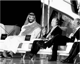  ?? REUTERS ?? Saudi Crown Prince Mohammed bin Salman with SoftBank Chairman Masayoshi Son at the Future Investment Initiative conference in Riyadh last year