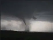  ?? (Washington Post/Matthew Cappucci) ?? A large tornado whirls in 2019 near McCook, Neb. Research has shown that tornadoes are just as common in the Deep South as they are in what is typically referred to as tornado alley.