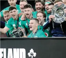  ?? — AFP photo ?? File photo shows Ireland captain Johnny Sexton holds the Six Nations trophy.