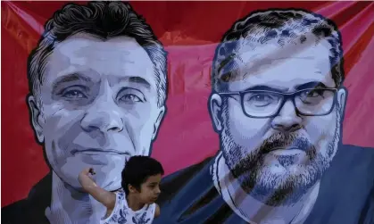 ?? Photograph: Eraldo Peres/AP ?? A banner in Brasília showing British journalist Dom Phillips, left, and indigenous expert Bruno Pereira during a rally calling on the authoritie­s to investigat­e their deaths.