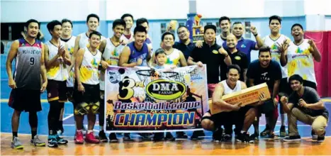  ??  ?? CHAMP AT LAST. Mark Anthony Constructi­on and Supply (Macs) celebrates after winning the DMA Farms League held at the Montaña Gym, Wednesday evening.