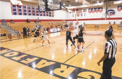  ?? HANNAH RUHOFF/STAFF ?? Grafton sophomore Kiara Bomboy shoots against York in the Clippers’ season opener Thursday. Grafton won 49-32.