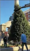  ??  ?? The annual Troy Christmas tree gets put up in Monument Square in 2017.