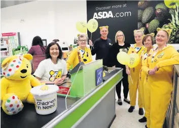  ??  ?? Charity champs Asda staff will be fundraisin­g throughout November