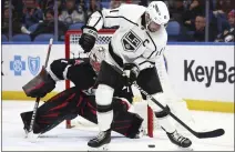  ?? JEFFREY T. BARNES — THE ASSOCIATED PRESS ?? Kings center Anze Kopitar is stopped by Sabres goaltender Ukko-Pekka Luukkonen during the second period of Tuesday’s game in Buffalo.