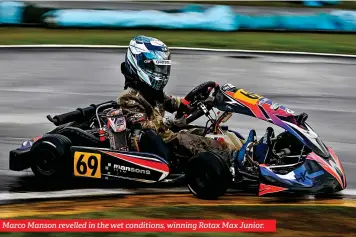  ?? ?? Marco Manson revelled in the wet conditions, winning Rotax Max Junior.