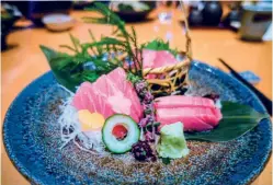  ??  ?? FISHY BUSINESS Sisam, the Japanese restaurant at Hilton Niseko Village focuses on local produce and seafood from the Hokkaido region such as this plate of fresh toro sashimi