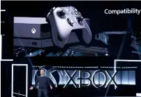  ?? — AFP ?? Kareem Choudhry introduces the new Xbox One X.