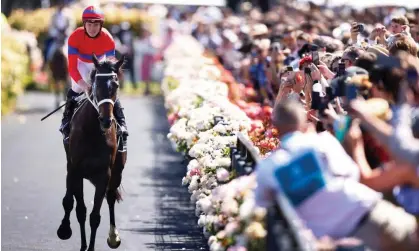  ?? Photograph: Daniel Pockett/Getty Images ?? James McDonald and Verry Elleegant after last year’s Melbourne Cup win. ‘Melburnian­s had been voting with their feet – Cup attendance numbers declined 26% from 2010 to 2019. TV ratings have also plunged to record lows.’