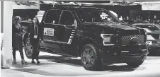  ?? FREDERIC J. BROWN/AFP/GETTY IMAGES ?? Motor Trend magazine’s 2018 Truck of the Year was the Ford F-150 Lariat Truck. Ford is planning to enhance its vehicles including the F-150 pickup line to boost its market share.