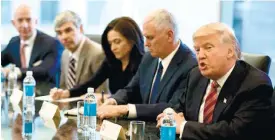  ?? (AP FOTO) ?? PRESIDENT-ELECT DONALD TRUMP speaks during a meeting with technology industry leaders at Trump Tower in New York. From left are, Amazon founder Jeff Bezos, Alphabet CEO Larry Page, Facebook COO Sheryl Sandberg, Vice President-elect Mike Pence, and Trump.