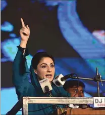  ??  ?? FIERY: Maryam Nawaz, daughter of former prime minister Nawaz Sharif, gestures during a speech at the first opposition rally aimed at ousting the incumbent government of Prime Minister Imran Khan in Gujranwala Friday night. (AFP)