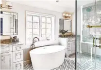  ?? STACY ZARIN GOLDBERG FOR THE WASHINGTON POST ?? Most clients want a very classic bathroom or a serene, spalike space, says interior designer Michael Winn. For both looks, a white color scheme is timeless.